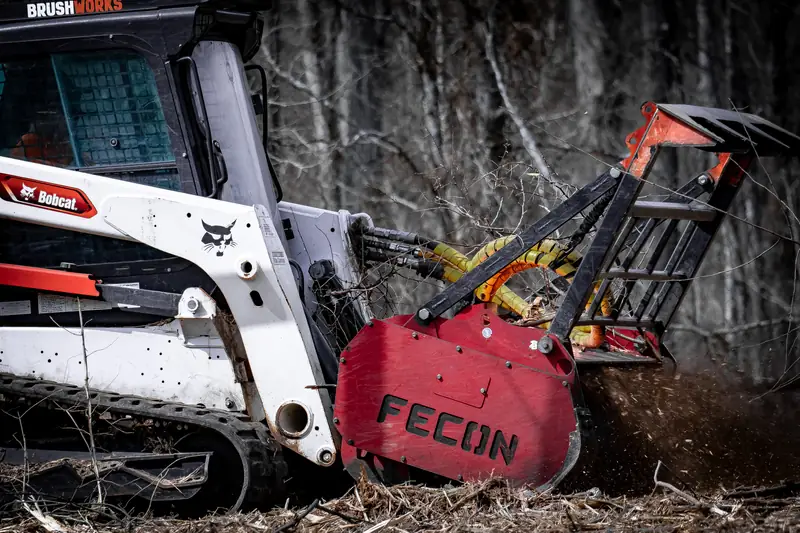 Professional forestry mulching equipment clearing overgrown brush and dense vegetation in Cincinnati, Ohio