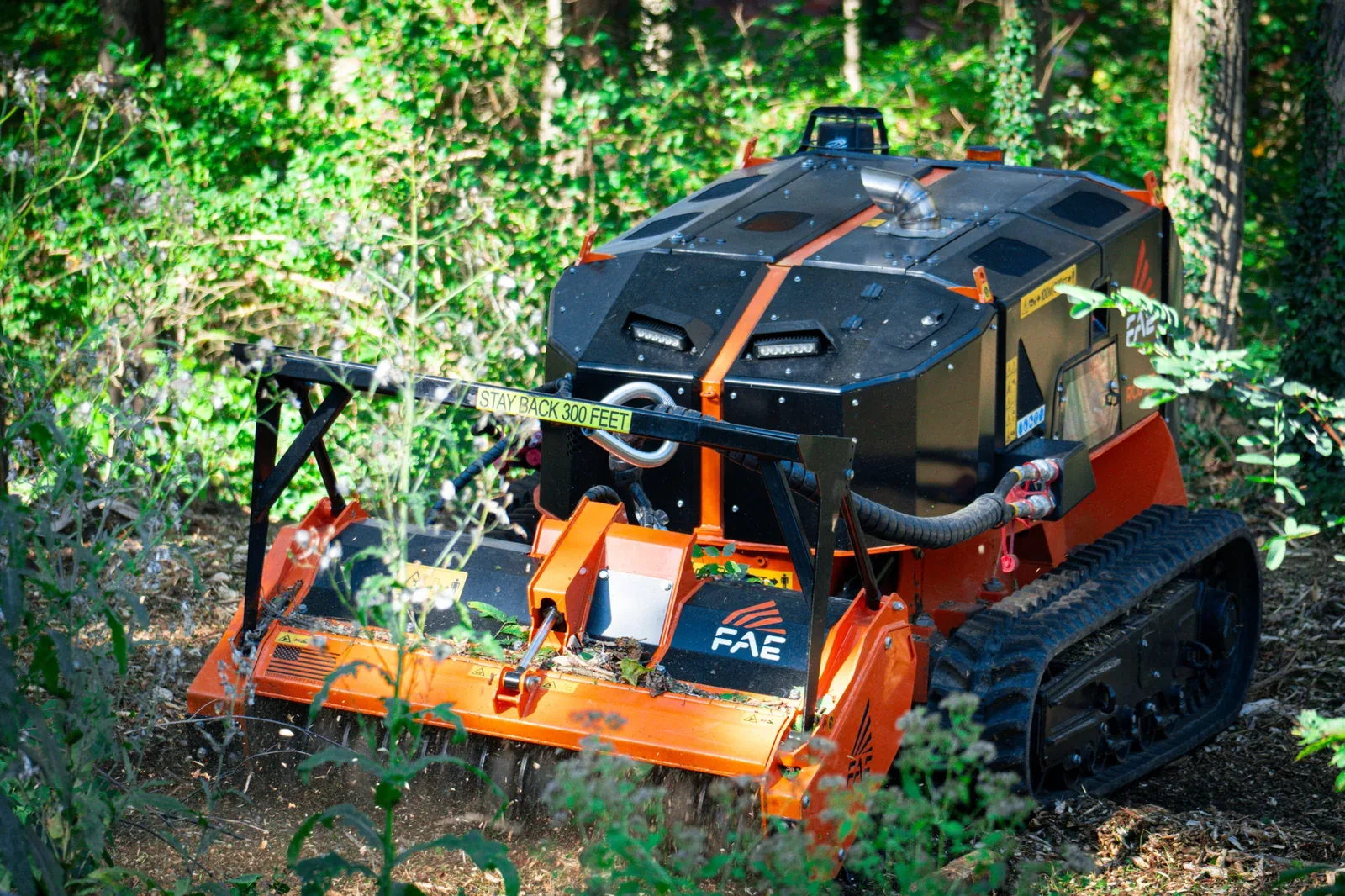Forestry mulcher working on tree service job site